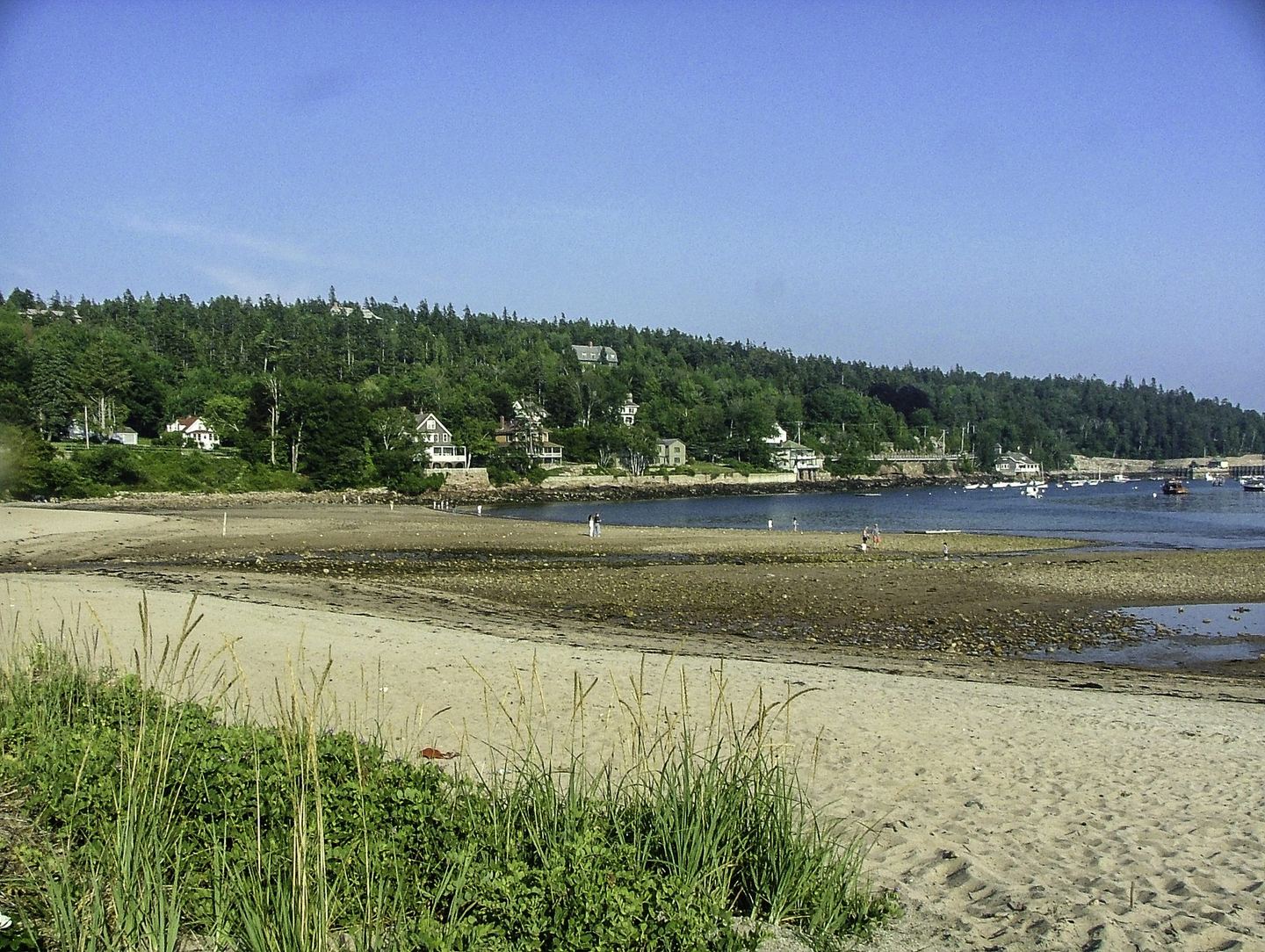 Seal Harbor village and boats seen across the beach